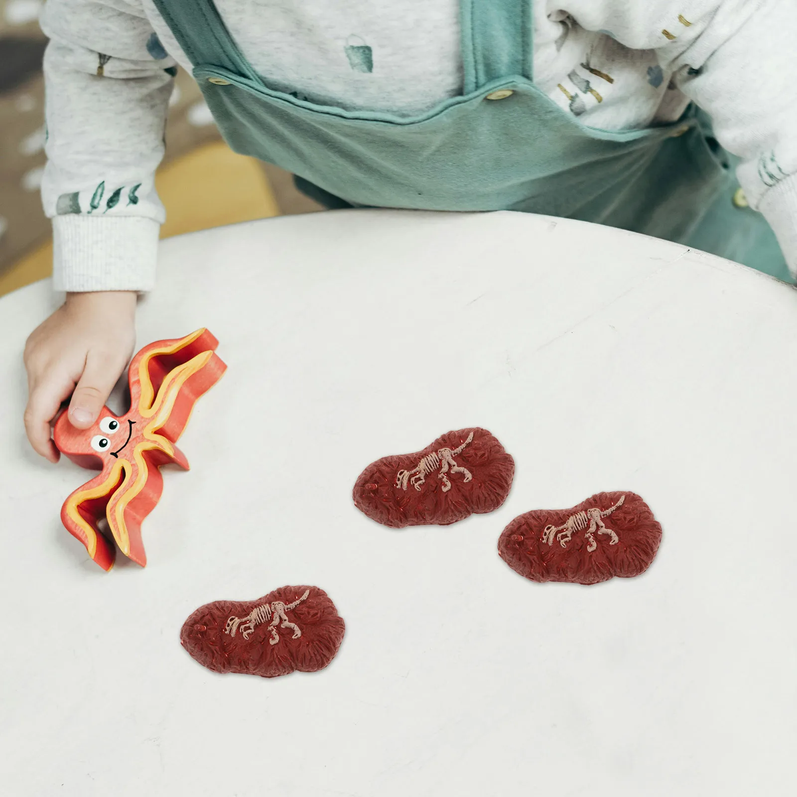 50 szt. Symulowane foszylie dinozaurów, mini dekoracje do krajobrazu piaskowego, ozdoby na biurko, artystyczne okazy, relaksujące i edukacyjne.