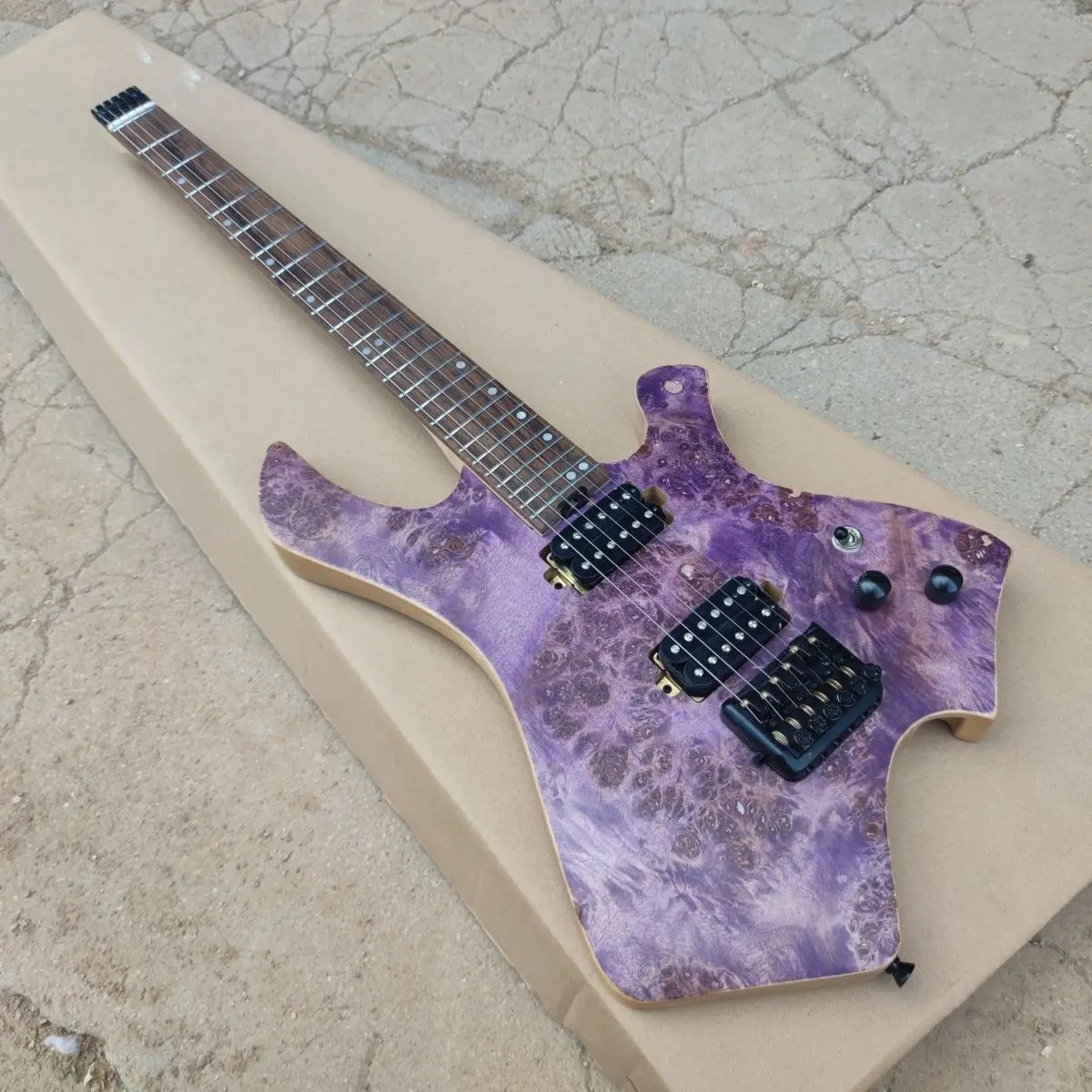 Special shape electric guitar, ash xylophone body, stainless steel wire. Burl veneer, body ash