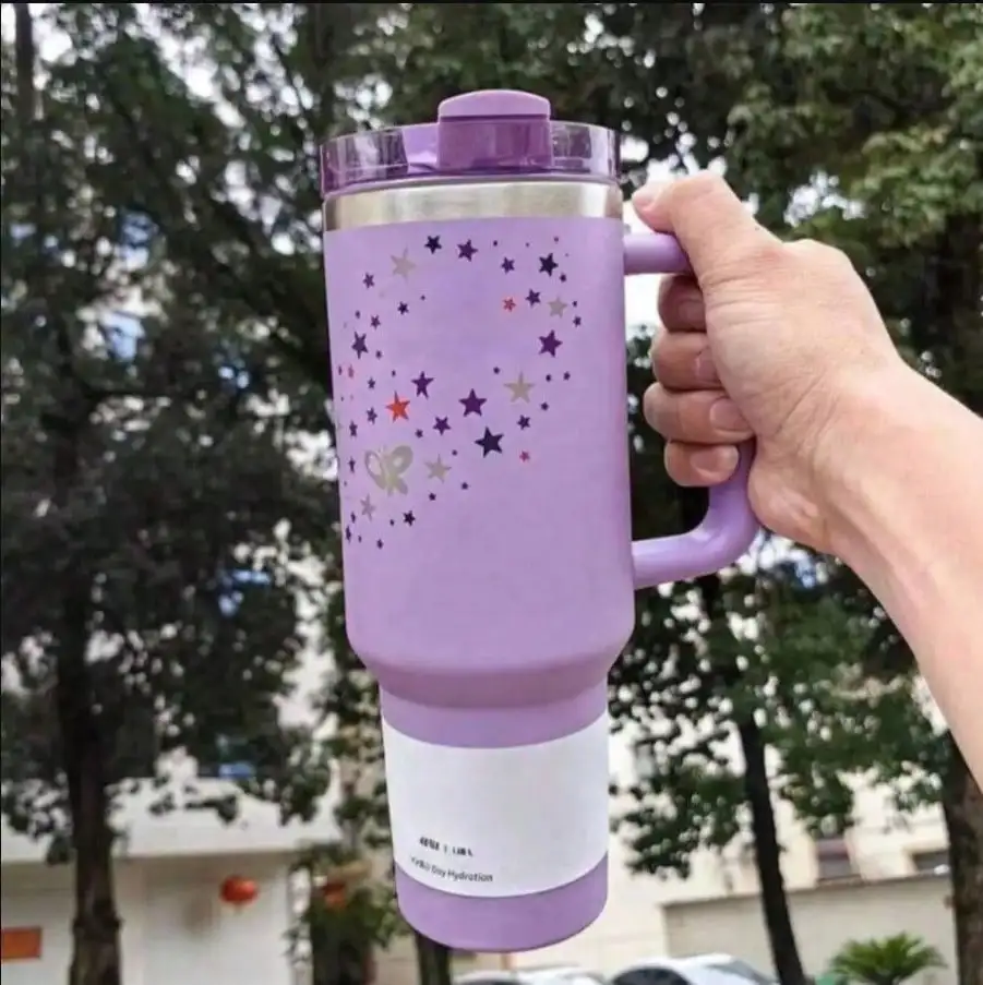 

A 40-Ounce Stainless Steel Insulated Cup With A Handle And A Straw, And A Lid With Three Positions. Suitable For Traveling And Outdoor Camping. The Sky Is Filled With The Colors Of Stars7284672