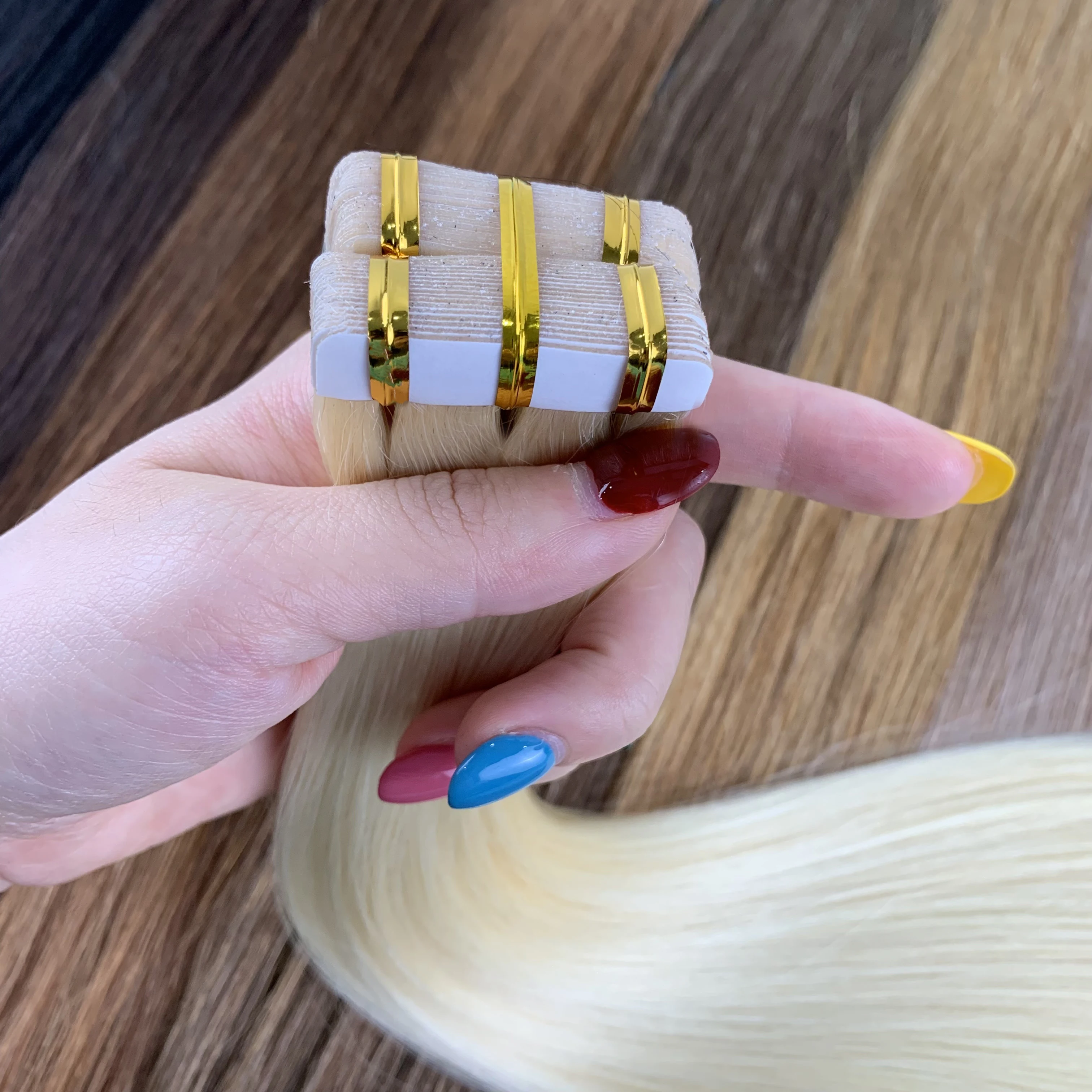 Doczepiane włosy Shinehair na taśmie, prawdziwe naturalne włosy ludzkie, wietnamskie włosy ludzkie, proste, bezszwowe pasma na taśmie dla kobiet.