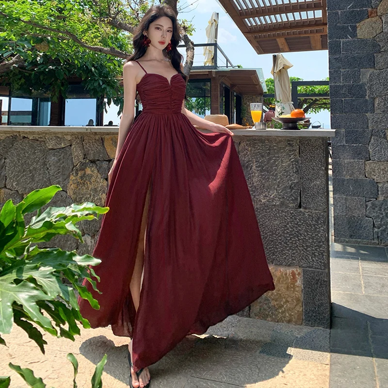 Nueva moda Sexy Spaghetti Strap espalda descubierta vestido sólido de las mujeres una línea de cintura delgada exquisitos vestidos de fiesta de vacaciones de verano