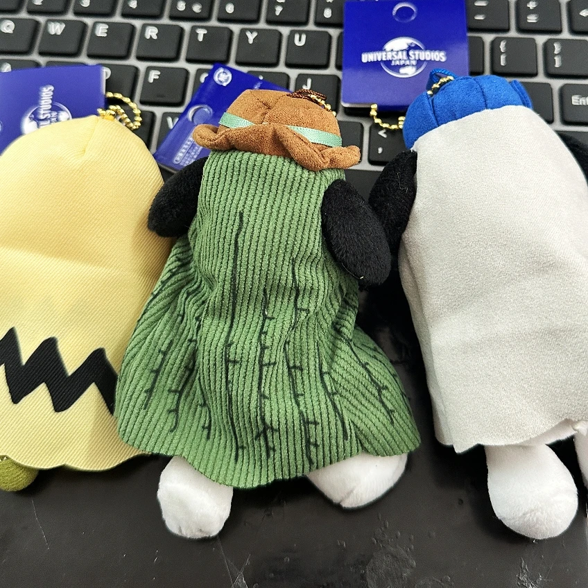 4 pièces 10CM Snoopy Anime cache-cache sac Snoopy série dessin animé en peluche poupée porte-clés pendentif jouets en peluche