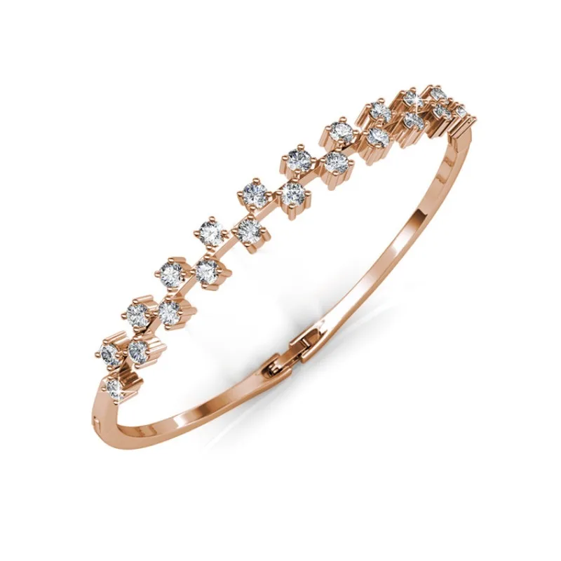 

Daisini Cross Over Design Bangle Embellished with Premium Grade Crystal From Swarovski Jewelryfor Bride Wedding Party Accessory