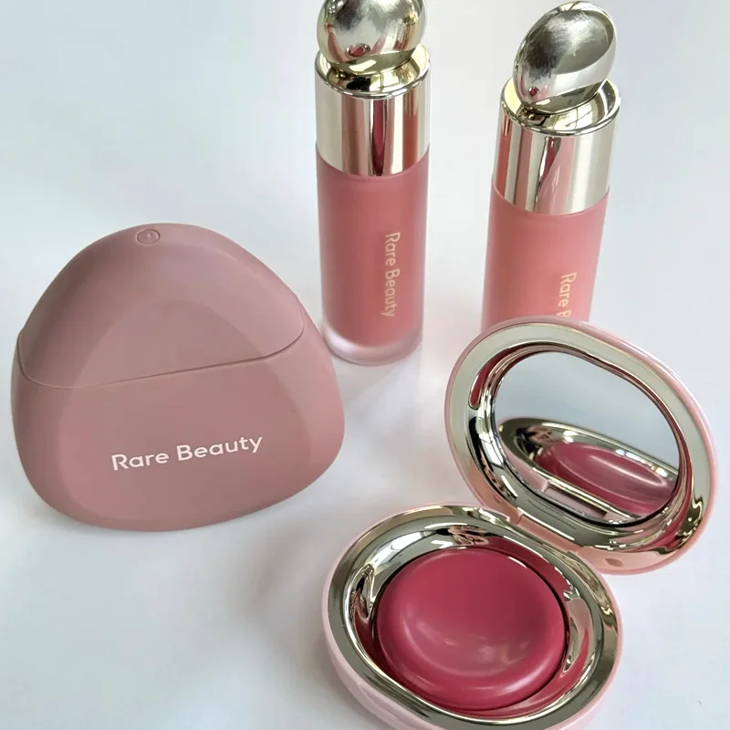 Crema de manos de belleza rara, luminizador líquido, espejo, resaltado, contorno líquido, colorete, maquillaje, brillo facial, lápiz labial muy más ligero