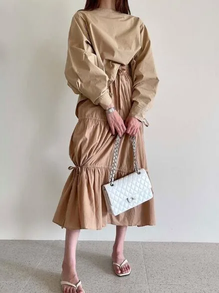 Spódniczka East Gate Small Ins w jednolitym kolorze, elastyczna talia, sznurek, asymetryczny dół z koronką, do pracy, kolekcja wiosenna...