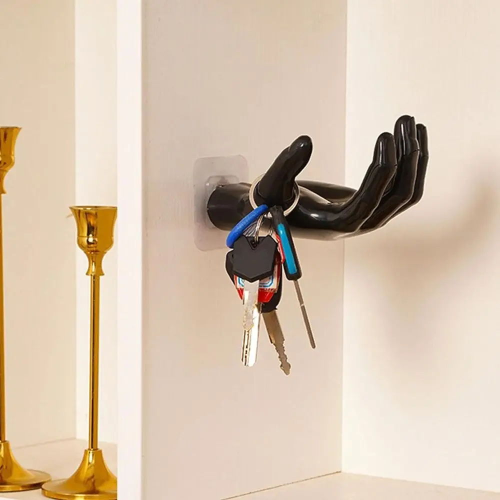Picture 5: Creative Plastic Hand Shape Hook Multi-functional Wall Hook Trace-less Hanger Hook Solid Color Display Stand Home