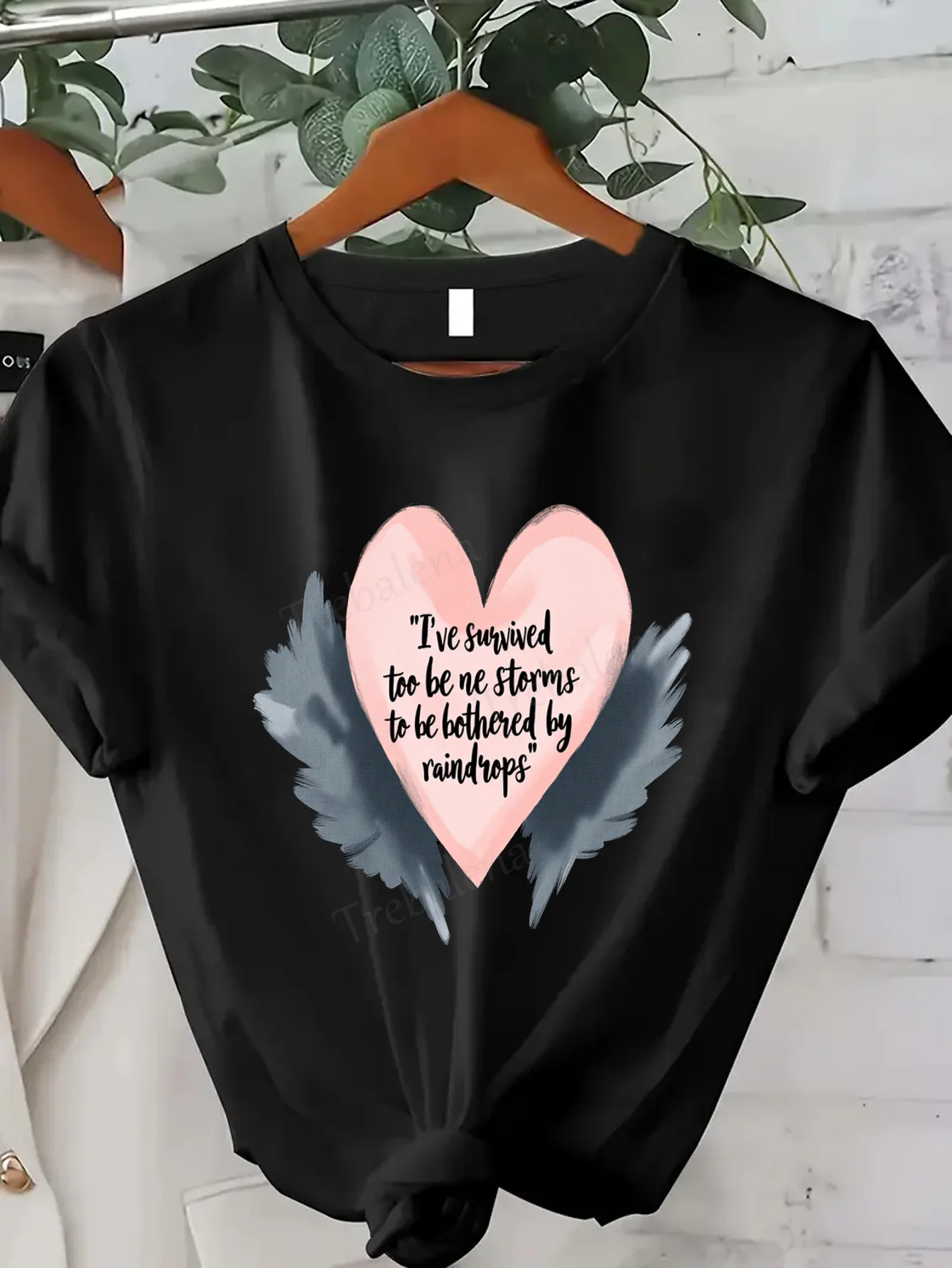 

Women T-shirt Sexy Women's T-Shirt "I've Survived Too Many Storms" Heart Wings Design