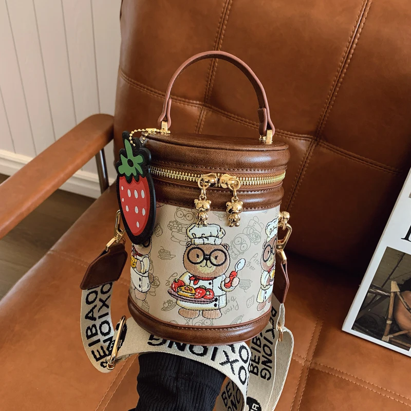 

Beibaobao shoulder crossbody bag for women 2025 new cartoon cylindrical retro hand-held bucket bag fashion cylindrical bag