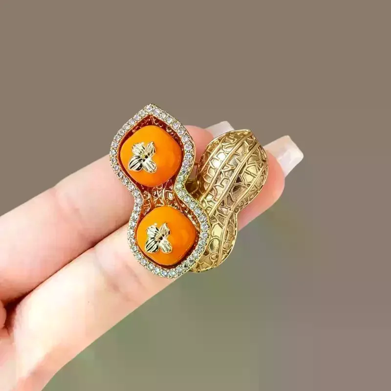 Shiny CZ Decorated Peanut Brooch Gold Plated Orange Agate Inlay Fashion Jewelry for Wedding Guest Outfit