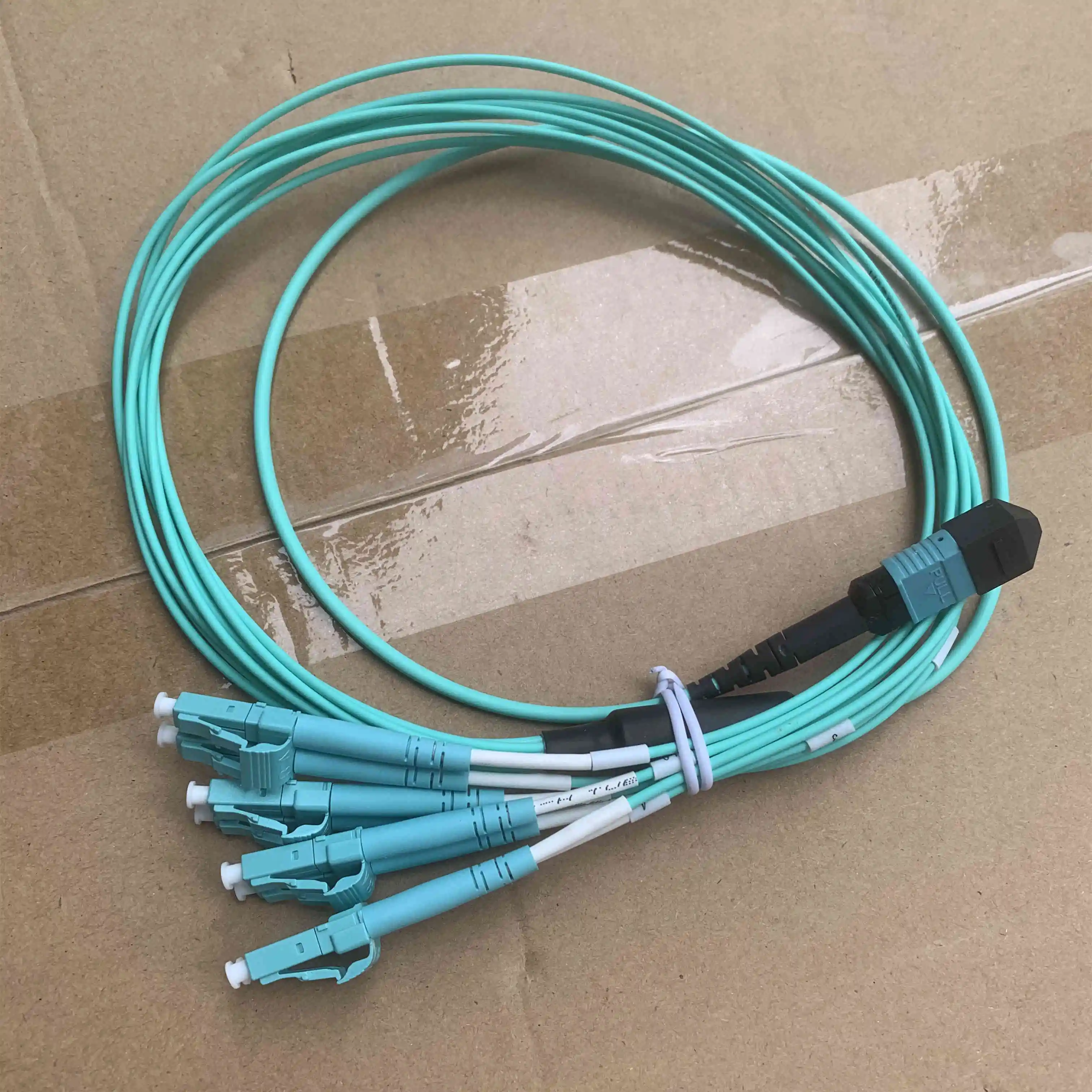 Cable de conexión de fibra MPO-LC 8C 12C 24 núcleos tipo B OM3-150 hembra MTP-4DLC 6DLC ruptura 8C 12C 24C OM3 ftth puente cable óptico ELINK