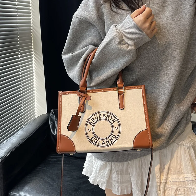 กระเป๋าโท้ทขนาดใหญ่สำหรับผู้หญิง กระเป๋าสะพายอเนกประสงค์ และกระเป๋าสะพายข้างขนาดใหญ่ ใช้งานได้ทุกวัน สไตล์มินิมอล