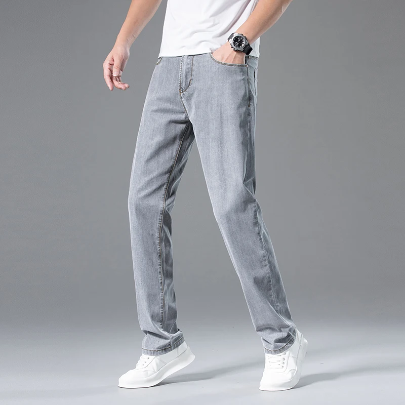 Jeans Lyocell da uomo ultrasottili estivi pantaloni Casual da lavoro dritti larghi pantaloni in Denim di marca grigio fumo con drappeggio morbido