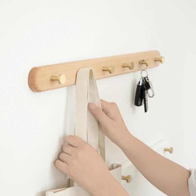 

Nordic solid wood hook door back wall hat storage hanger hanger entrance entrance door no punching creative brass wall hanging