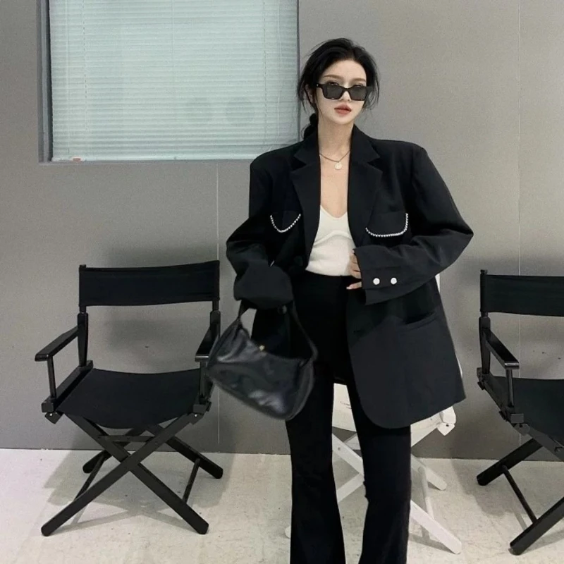 سترة نسائية سوداء اللون لربيع وخريف 2025 بتصميم عالي الجودة على الطراز الكوري سترة بدلة فضفاضة متوسطة الطول