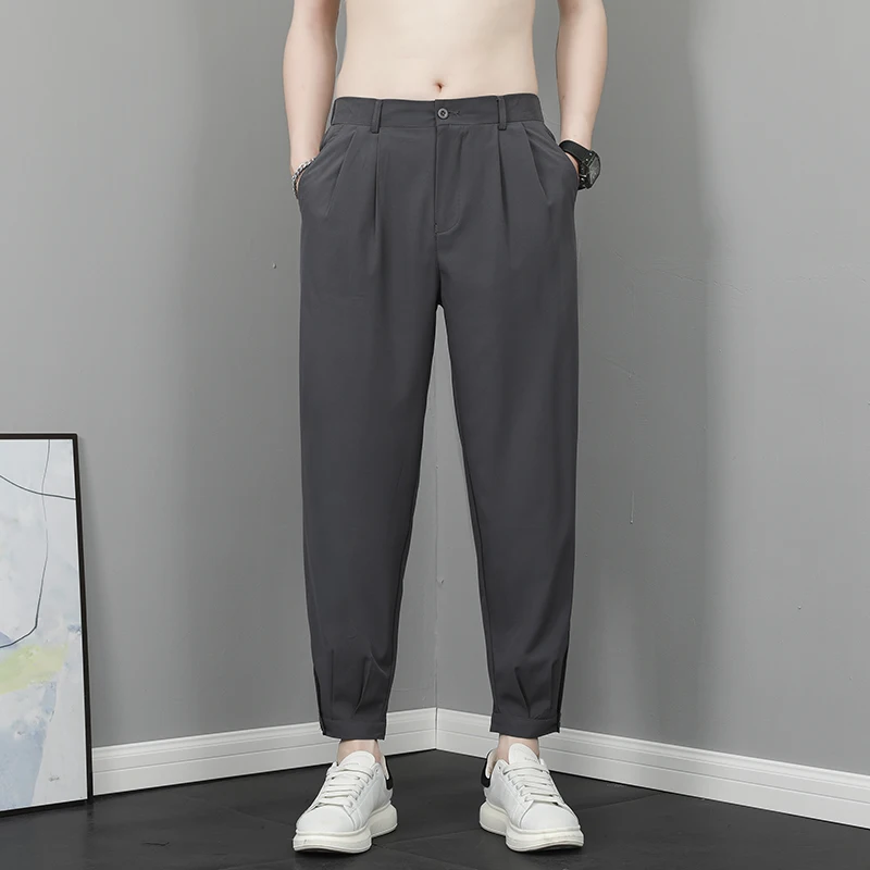 

Мужские повседневные брюки из ледяного шелка, летние, тонкие, свободные, с манжетами, быстросохнущие, спортивные, в стиле харлан, рабочая одежда, укороченные, для молодежи, активные, из полиэстера...