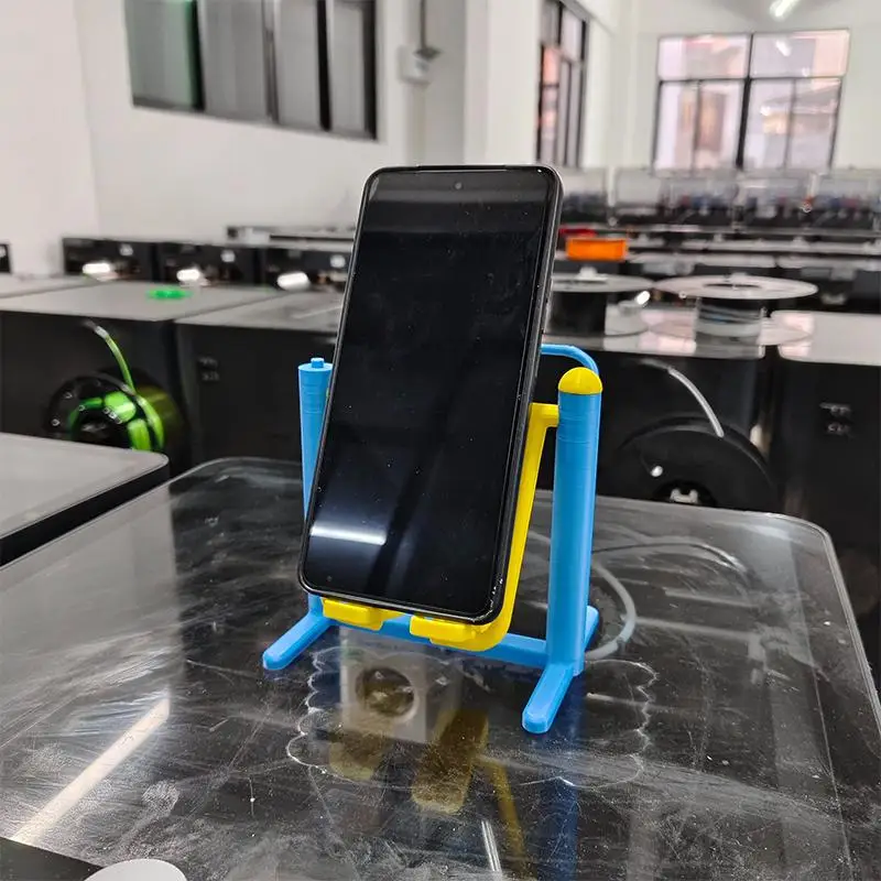 

Creative Phone Stand Assembly Fitness Equipment Quirky Lazy Stand For Vertical Video Viewing 3D Printed Desktop Ornament