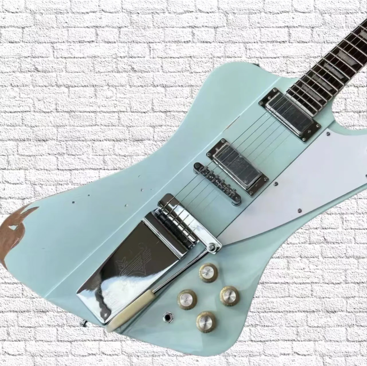 Inspired by the 1963 Firebird V Maestro Vibrola Frost blue electric guitar