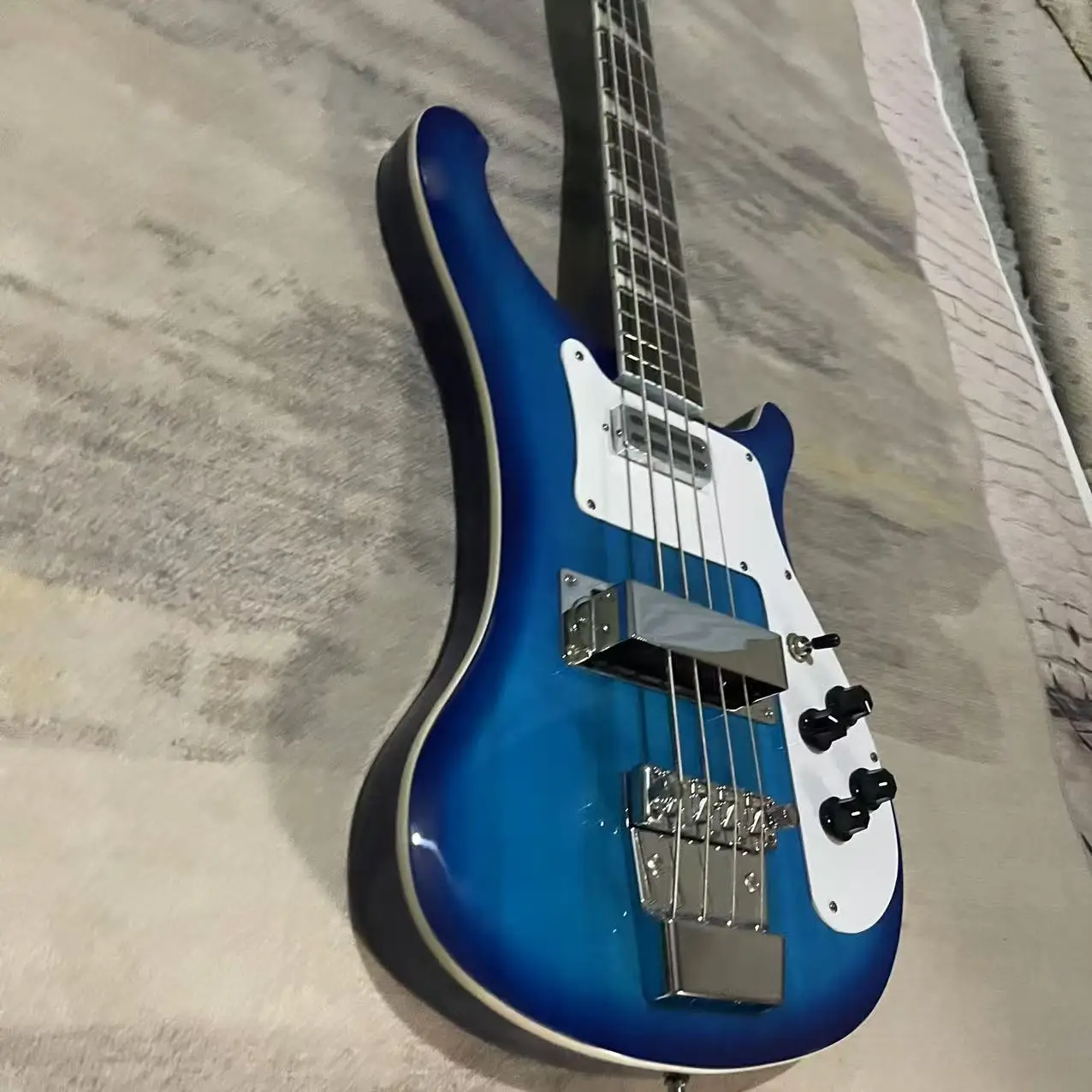 RickenBacker electric bass with 4 chords, transparent blue body, factory photographed shipping picture, in stock, order shipped