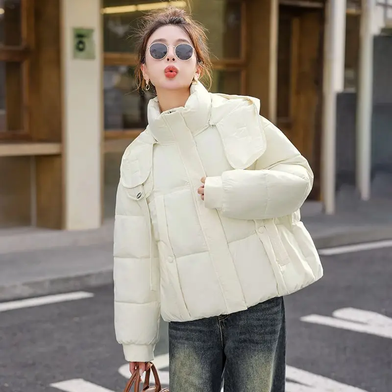 

Новая женская пуховая хлопковая куртка 2025, модная элегантная женская верхняя одежда, корейская версия, женская зимняя парка с капюшоном «Джокер», пальто