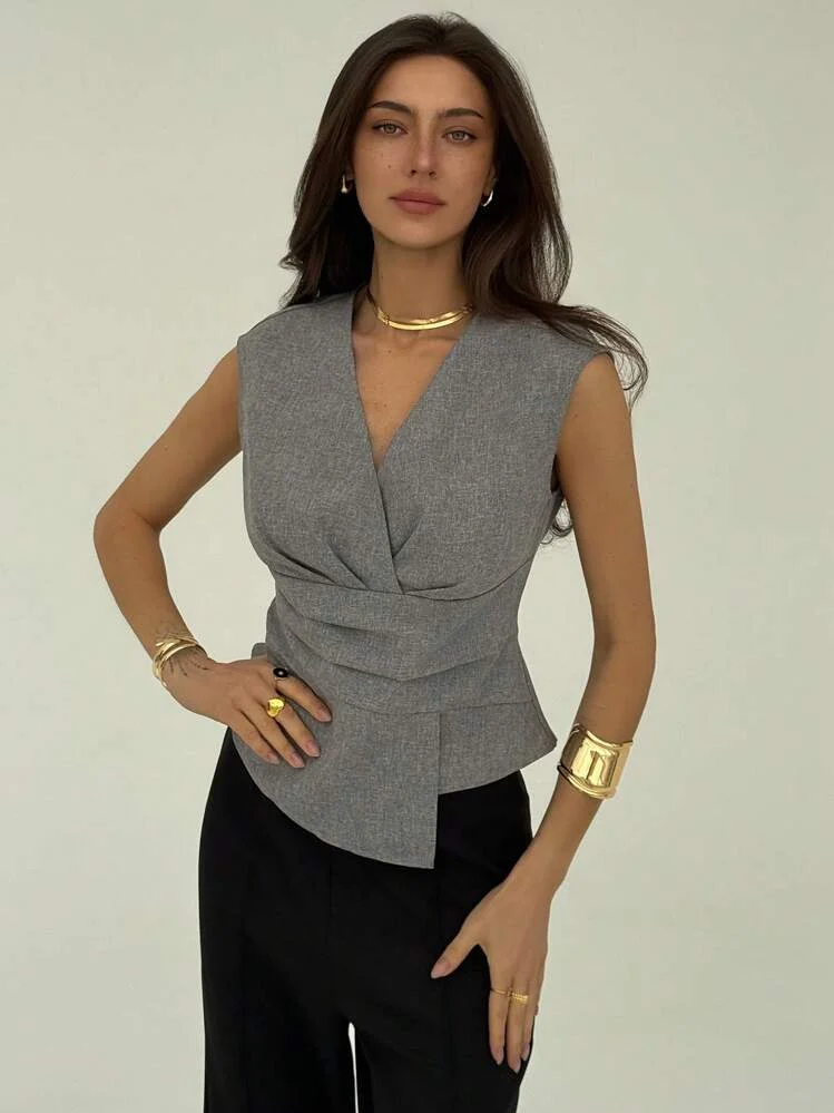 

Pop European And American Fashion V-neck Waist Cinched Irregular Hem Temperament Vest