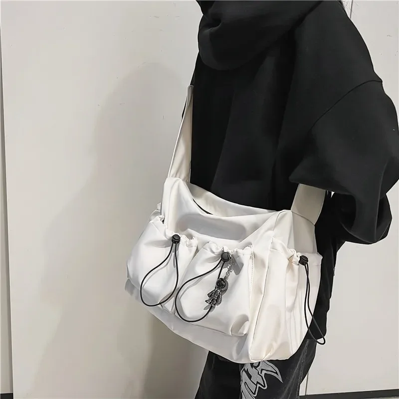 Fashion brand literary youth shoulder bag (female ins style) solid color lovers versatile work clothes bag (male canvas bag) sac