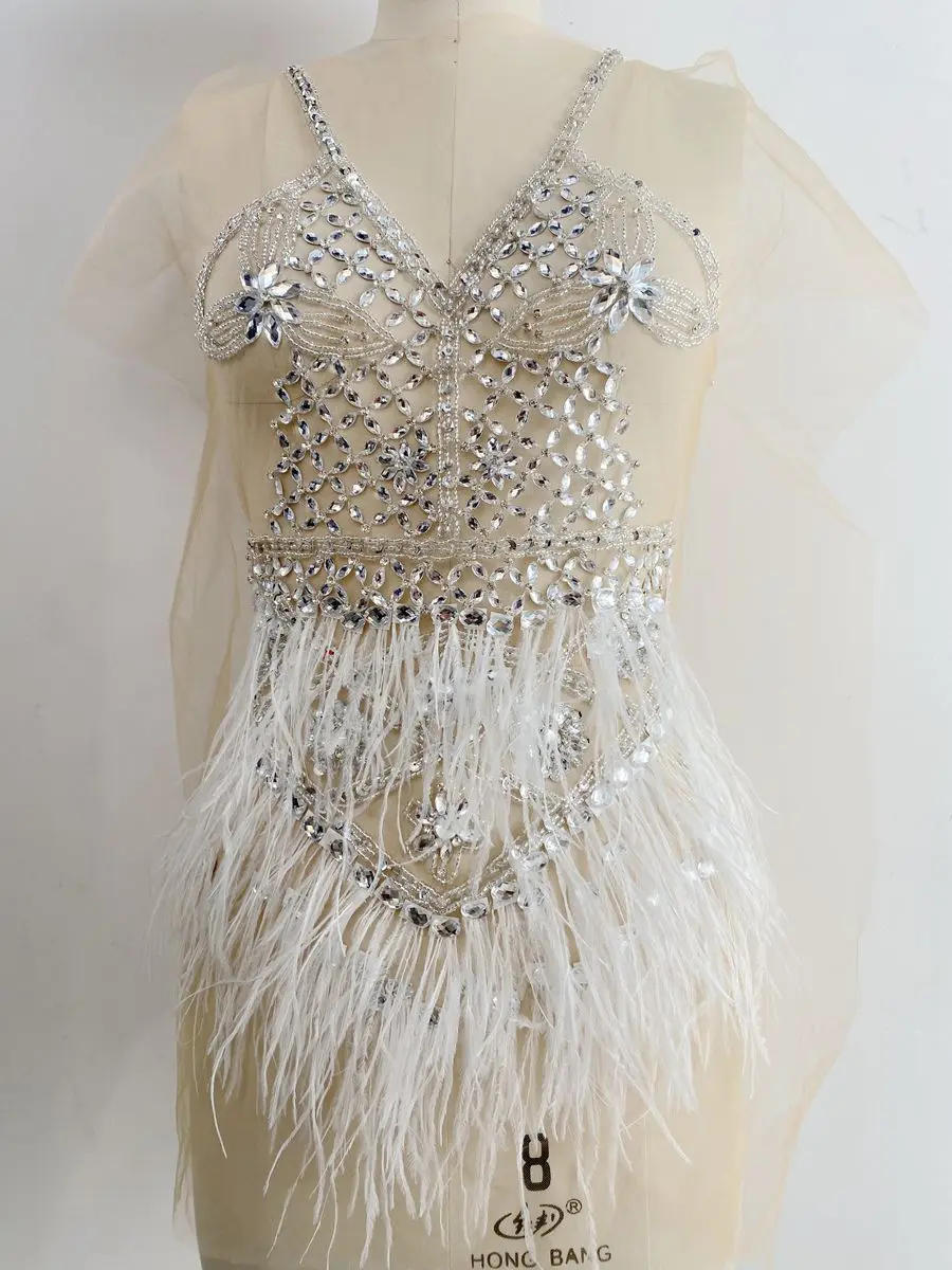 Abito da festa in pizzo tulle bianco argento tessuto piume di struzzo gonna sexy tubo di perline di lusso con paillettes strass materiale diamante caldo