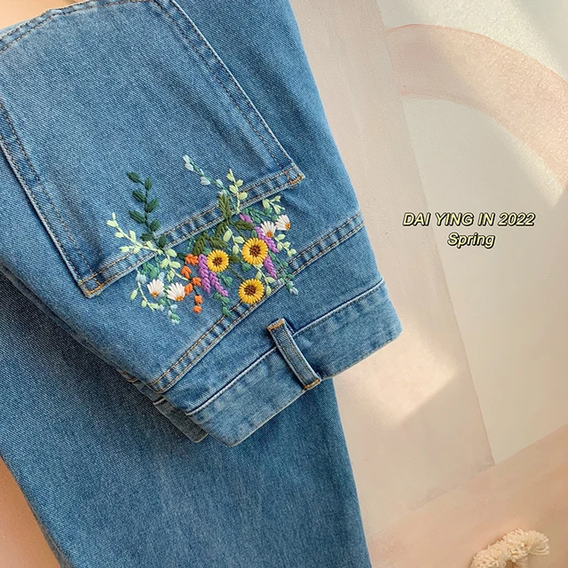 Jeans con fiori ricamati store
