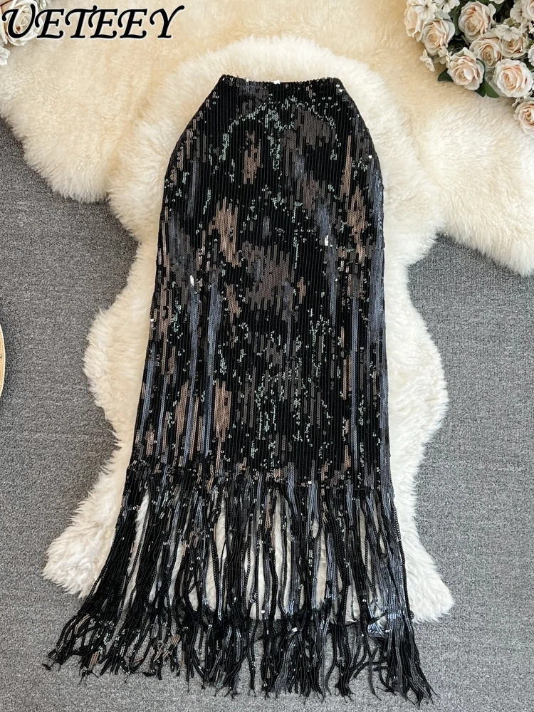 

Summer Korean Version of Celebrity Dance Typhoon Shiny Film Elastic Long Skirts High Waist Knee Tassel Hip Skirt for Women