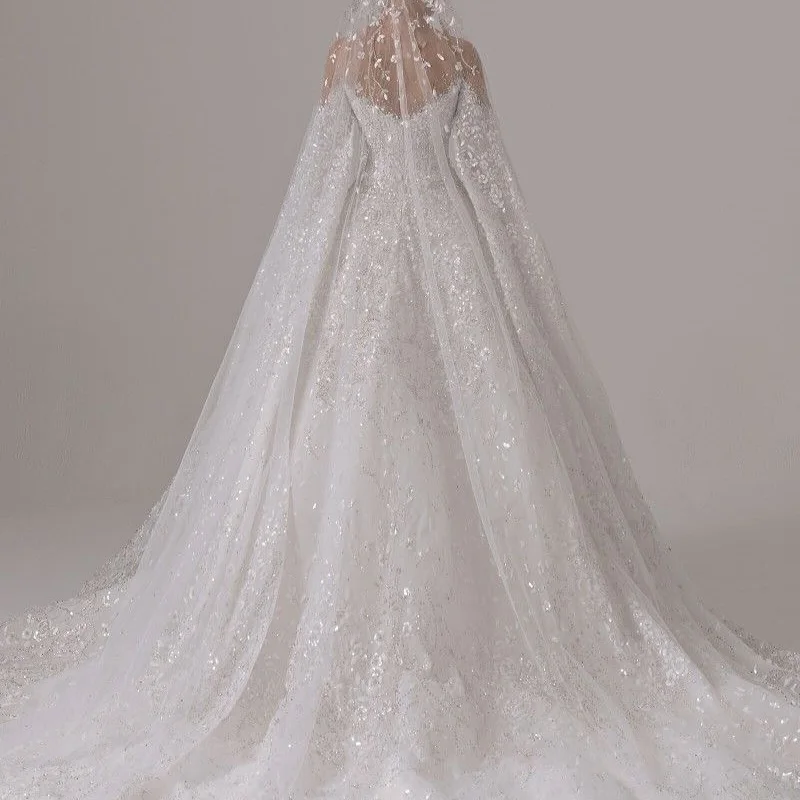 فستان زفاف رسمي فاخر أبيض مخصص قبالة الكتف وأكمام طويلة ذيل شابيل لحفلات الزفاف كريستال زي العرائس