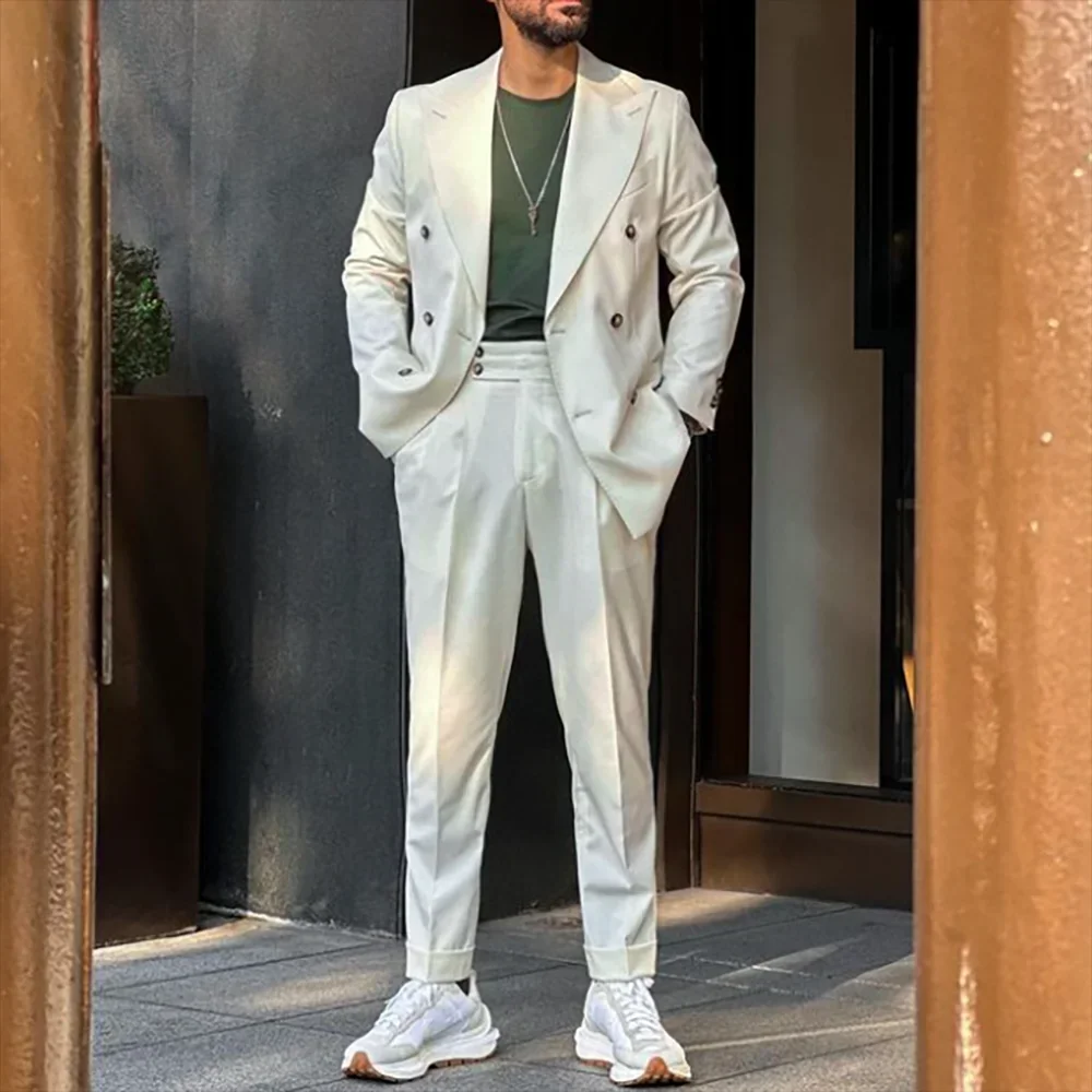 

Белые мужские костюмы, элегантные комплекты из двух предметов, куртка, брюки, двубортные повседневные наряды с остроконечными лацканами, вечерние, выпускные, свадебные, жених, платье на заказ
