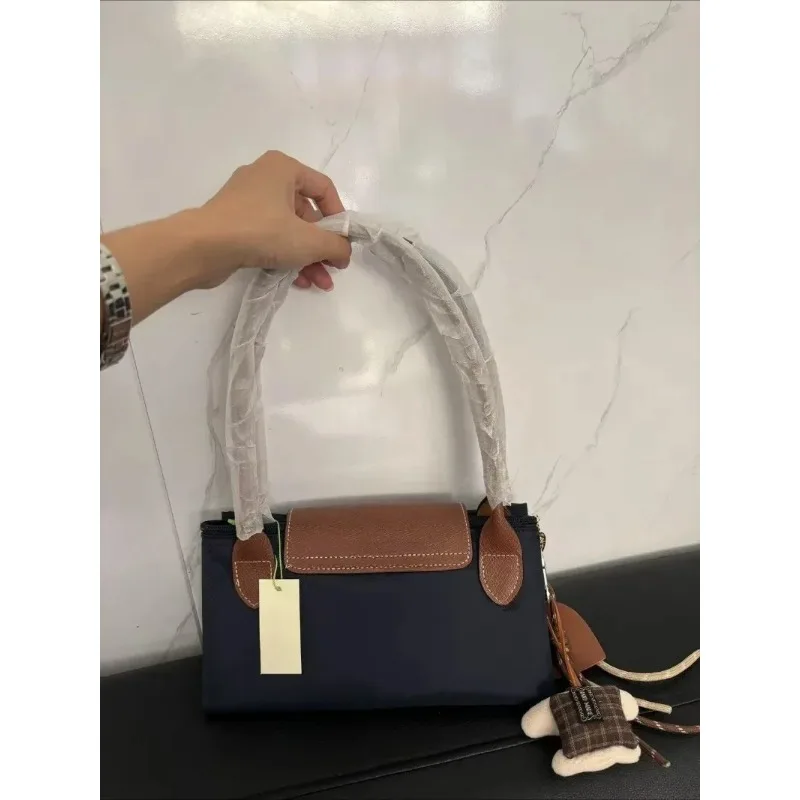 

Large French Style Nylon Mommy Bag 2025 Popular Soft Classic Pendant Women Tote Multi functional Main Bag Commuter