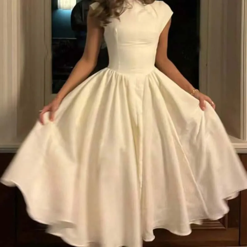 

YENKYE 2025 Women Sexy Backless Elegant Party Midi Dress Short Sleeve O Neck Solid A-line Autumn Dresses Female Vestidos