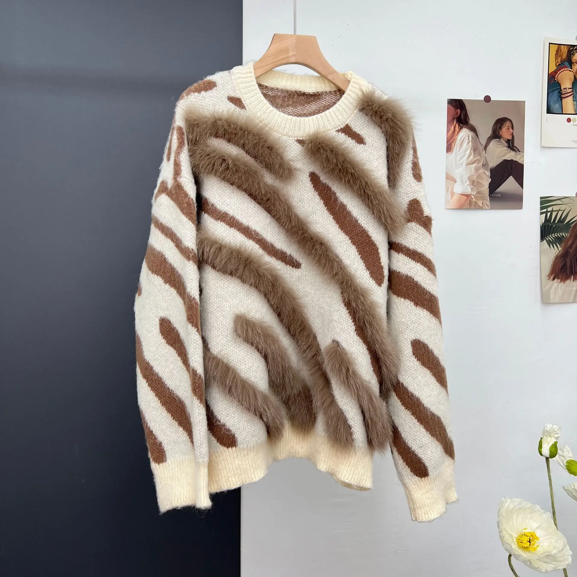 Chunqiu's new knitted pullover sweater, made of real fur and grass, with thick and warm loose top, exudes a sense of