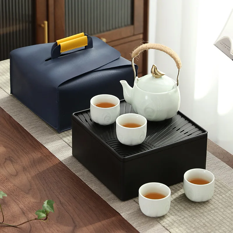 High end travel tea set, ceramic travel set, one pot, four cups, lifting beam teapot with bag tea set