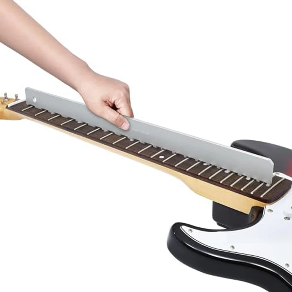 Guitar Technician's Essential Toolkit Features Sanding Beam Crowning File and Precision Fret Rocker for Optimal Setup