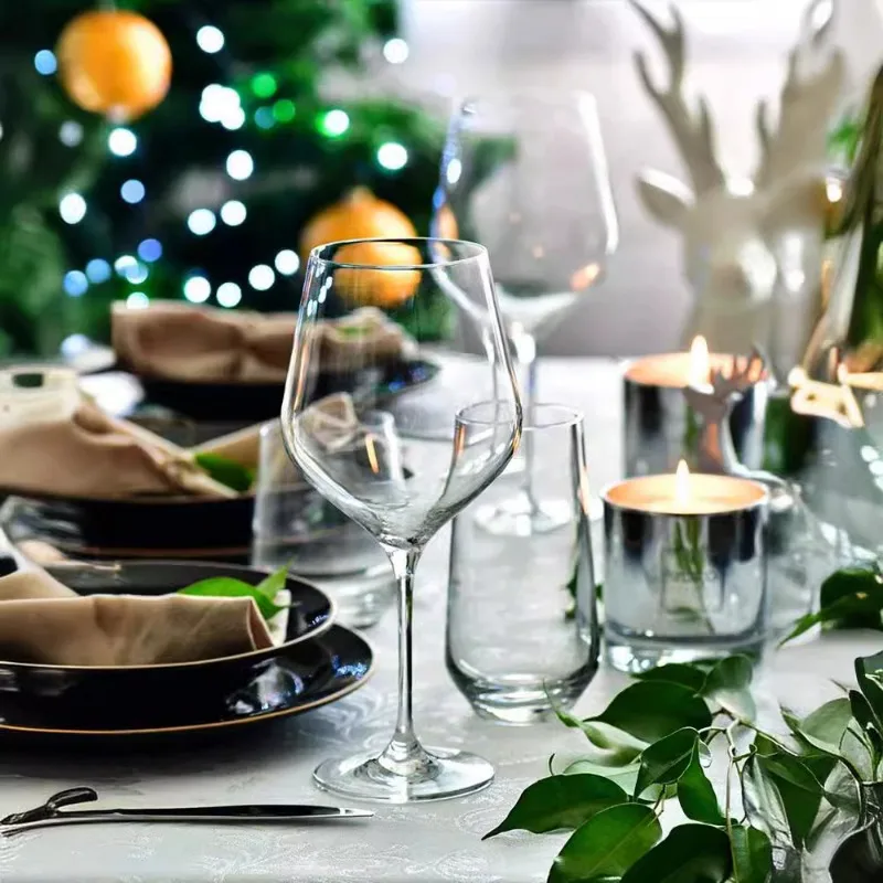 

Two large crystal glass goblets, wine glasses, household Bordeaux wine glasses