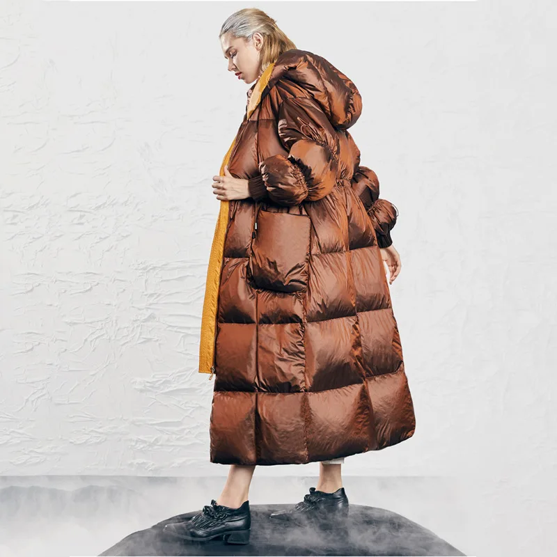 Zimowa nowa damska kurtka puchowa wiatro- i wodoodporna, z kapturem, o kroju oversize.