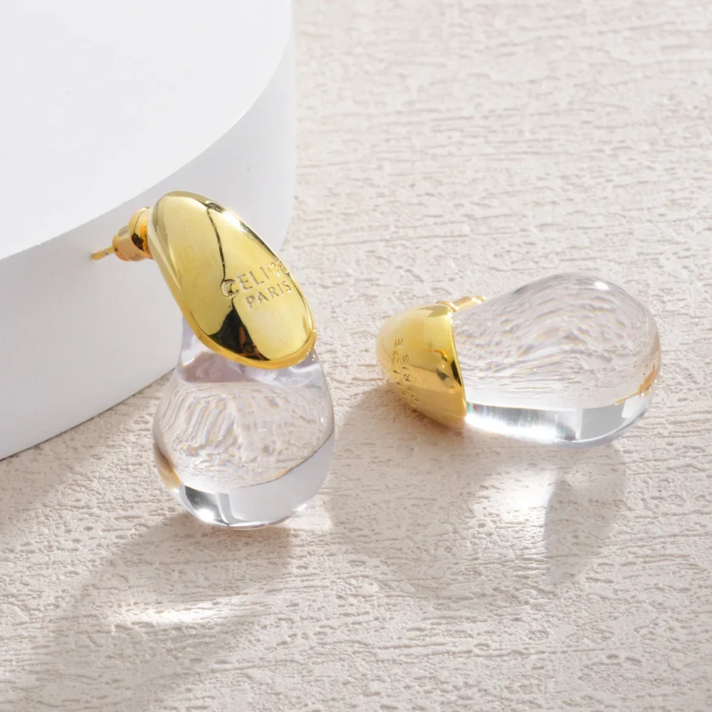 أقراط قطرة الماء الشفافة للنساء مطلية بالذهب تصميم عصري أنيق أقراط مكتنزة هدايا مجوهرات الزفاف