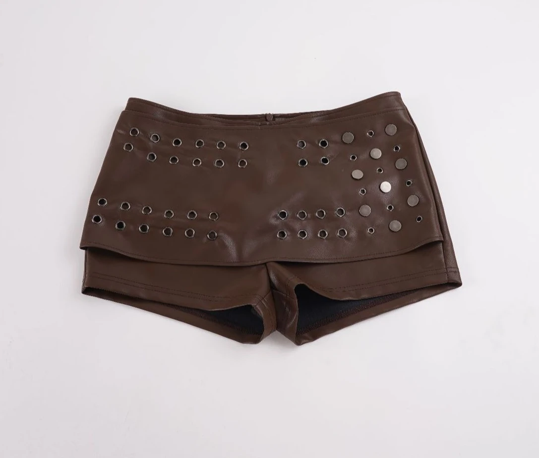 Retro Metal Contrasting Color PU Leather Punk Low Waist Hollow Corns Hip-wrapped Short Skirt Culottes