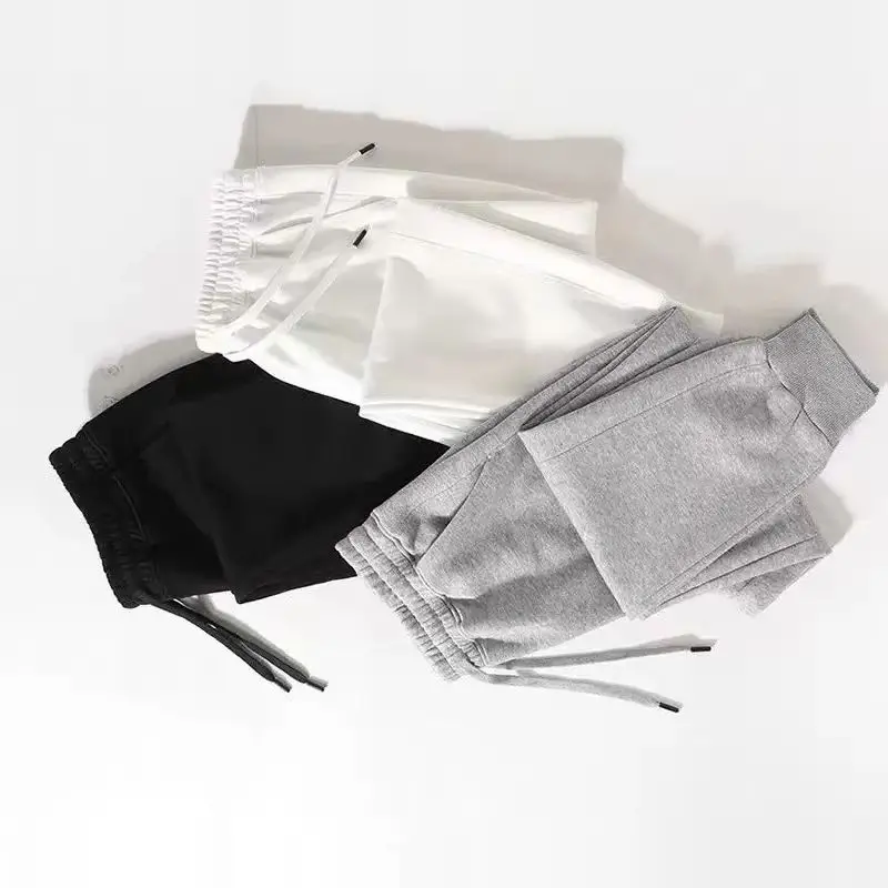 

2025 Повседневные спортивные штаны для мужчин, весенне-осенние свободные леггинсы с завязками, спортивные брюки эластичного трикотажа.