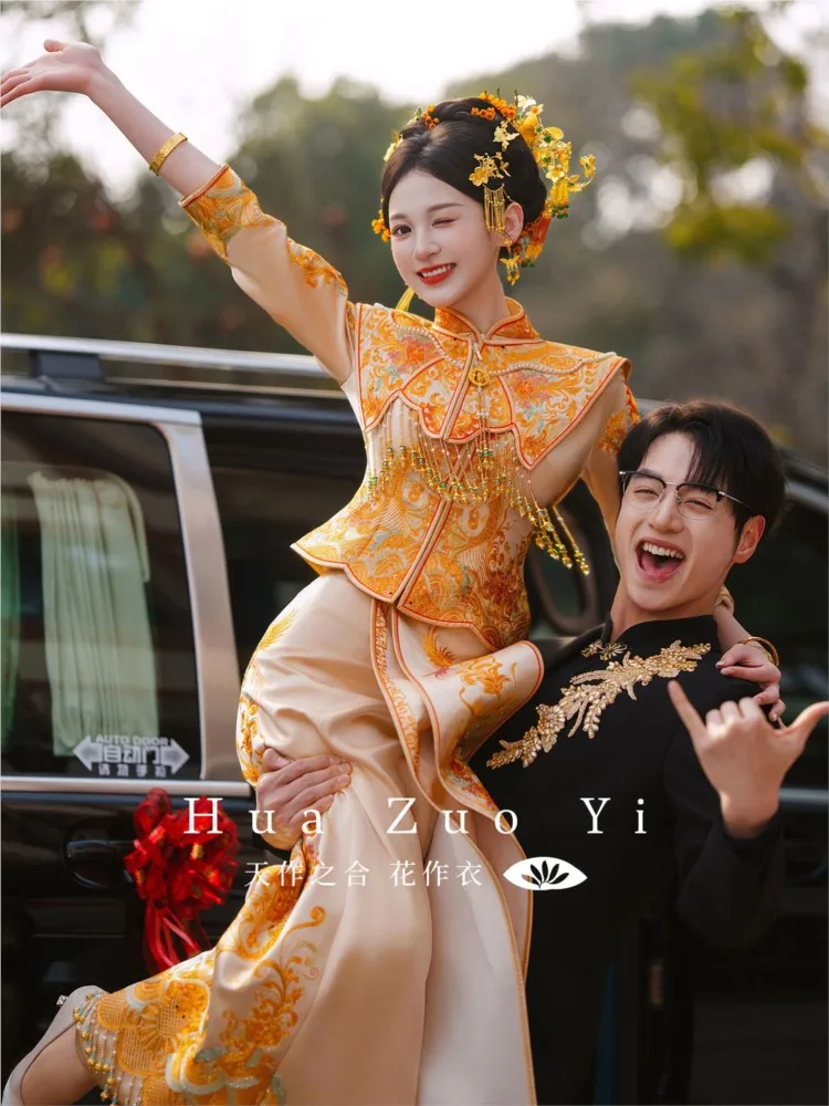 The Chinese-style dragon and phoenix gown is embroidered as a wedding dress