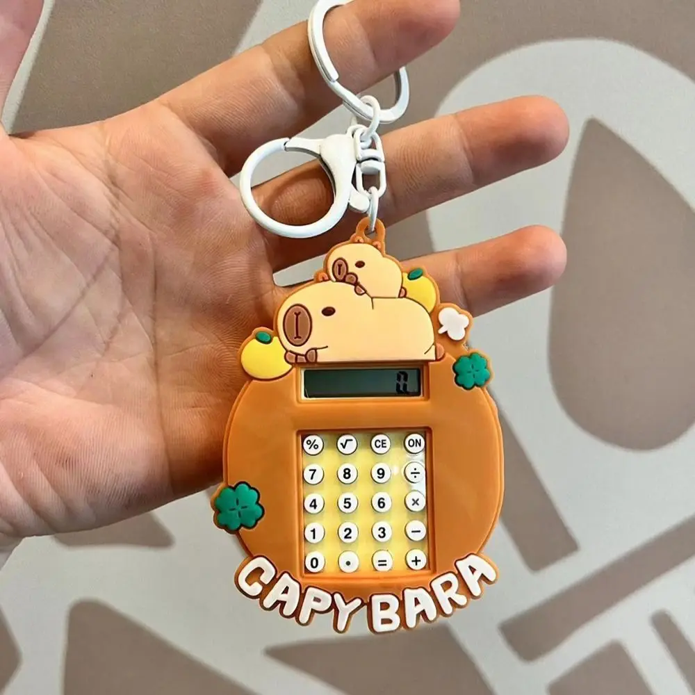 

Милый силиконовый калькулятор Kapybara, мультяшный калькулятор Kapybara, маленькая рыбка-фугу, канцелярские принадлежности, брелок, кулон