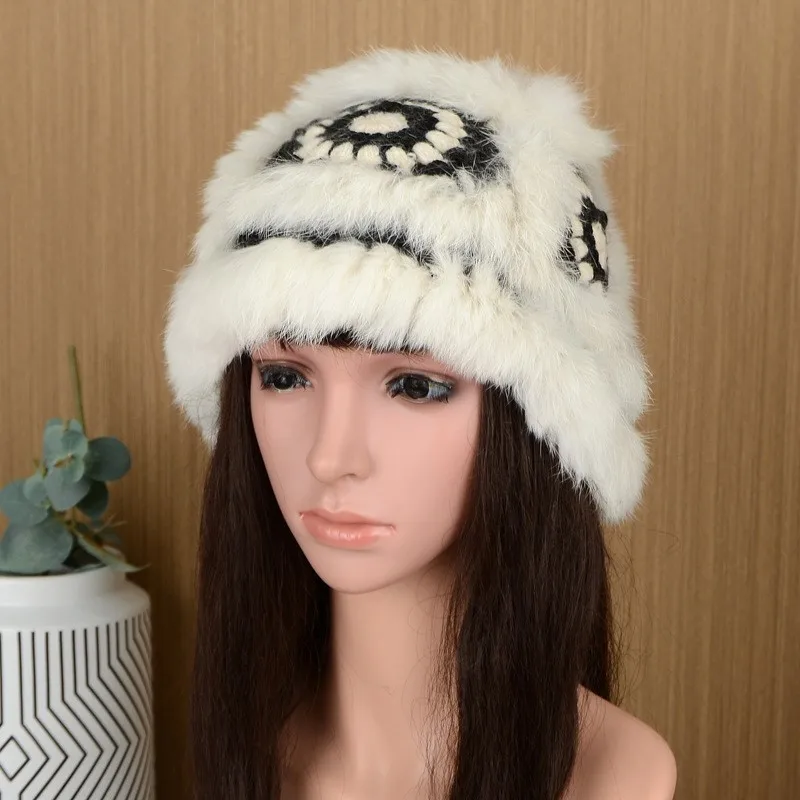 

The new woolen knitted flowered hat for women a fur basin with cap cover and no brim is made of real fashionable cute