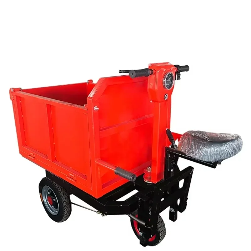 

Construction site electric seated trolleys and dump trucks