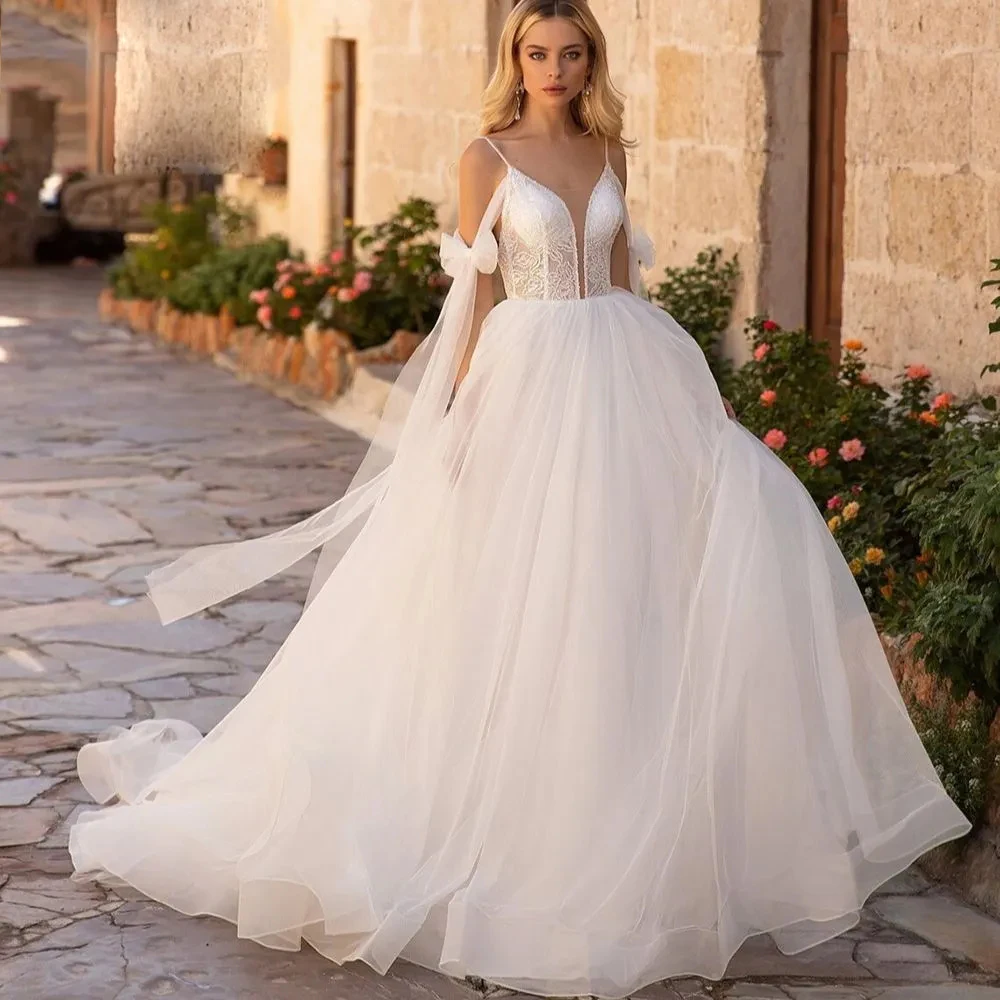 Eleganti abiti da sposa graziosi nuovo 2023 lusso scintillante perline Sexy scollo a v profondo Appliques corte treno principessa abito da sposa