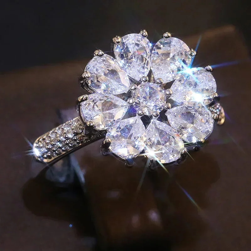 خاتم زهرة فضي اللون للنساء لامعة مكعب زركونيا حفل زفاف رومانسية سيدة الأزياء والمجوهرات