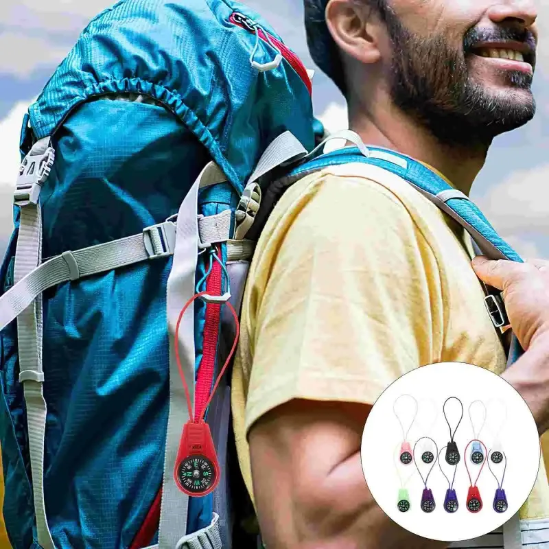Mini brújula ABS para acampar, senderismo, colgante de brújula de bolsillo, navegación portátil, escalada, montar, regalo para niños, equipo de supervivencia al aire libre