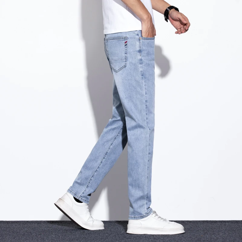 جينز قطني مرن للرجال عالي الجودة موضة أزرق فاتح مريح للأعمال سراويل مستقيمة غير رسمية سراويل ماركة فاخرة