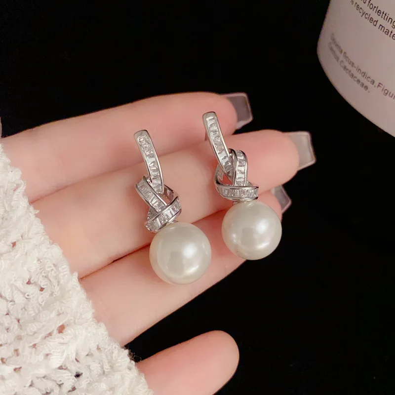 Light Luxury Micro Inlaid Zircon Knotted Pearl 925 Silver Needle Exquisite and Fashionable Super Sparkling Earrings