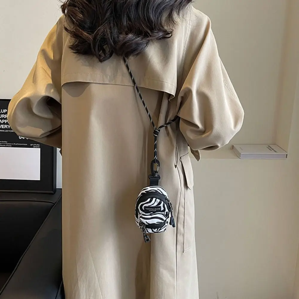 Bolsa crossbody portátil para homens e mulheres, mini porta-moedas, casais, fone de ouvido, chave, bolsas de ombro, hip hop, casual, mais recente